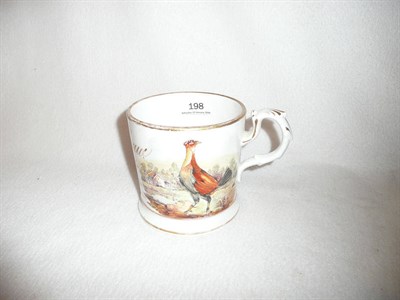 Lot 198 - Staffordshire cock fighting mug dated 1862