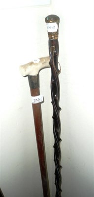 Lot 215 - 18th century walking cane and another cane, inscribed North Eastern railway