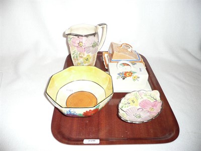 Lot 228 - Clarice Cliff Gay Day bowl, Arthur Wood jug and dish and two cheese dishes