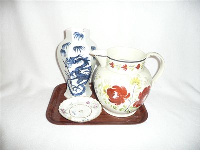 Lot 233 - Staffordshire jug, Worcester teapot stand and an English dragon vase