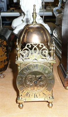 Lot 244 - 20th century lantern-style clock