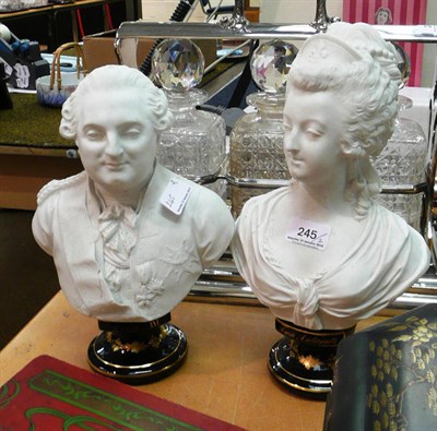 Lot 245 - A pair of French bisque porcelain busts of Louis XVI and Marie Antoinette, faux Sevres mark, (a.f.)