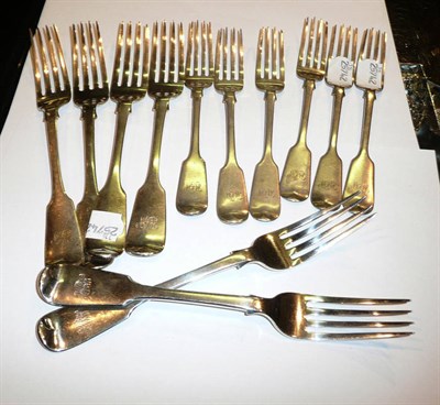 Lot 272 - Six fiddle pattern table forks and six dessert forks