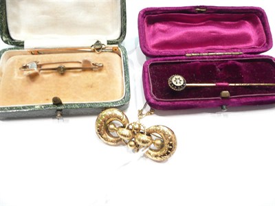 Lot 273 - A Victorian brooch, two other brooches and a stick pin