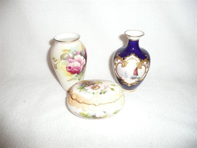 Lot 283 - Crown Derby vase signed J Dean, Royal Worcester box signed G Cole, and a Worcester vase roses