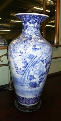 Lot 309 - 19th century Japanese blue and white vase and stand