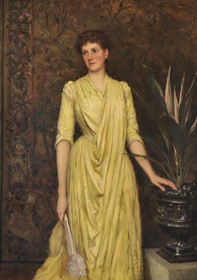 Lot 805 - William Oliver (fl.1865-1897) Portrait of Mrs Ambler, three quarter length, wearing a yellow dress