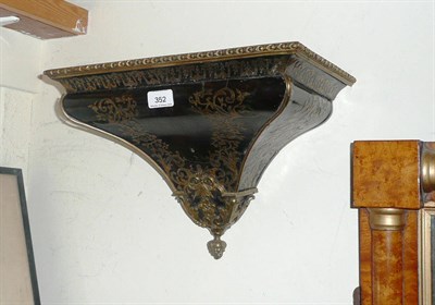 Lot 352 - Brass inlaid clock bracket