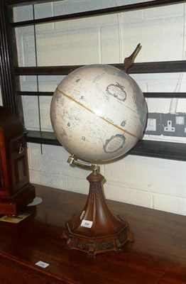 Lot 356 - Replogle 12ins globe on wood-effect base