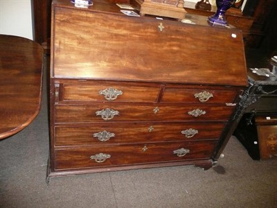 Lot 411 - A Georgian mahogany bureau