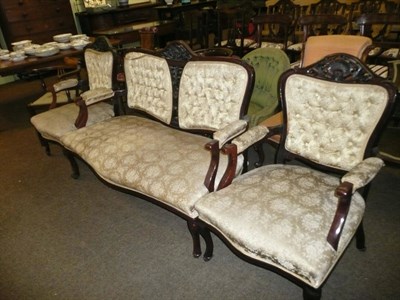 Lot 424 - Early 20th century carved mahogany sofa and two matching elbow chairs