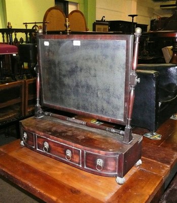 Lot 458 - Early 19th century mahogany toilet mirror, the base fitted with three drawers, on four ball...