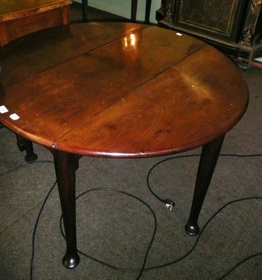 Lot 478 - An early 19th century mahogany drop leaf table