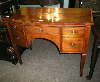 Lot 479 - A George III Mahogany, Satinwood and Ebony Strung Bowfront Sideboard, of small proportions, the...