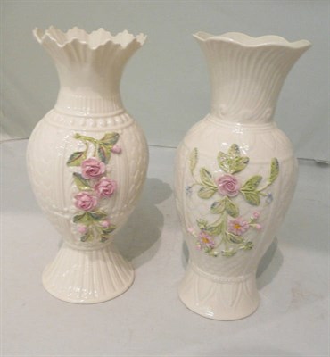 Lot 4 - A Belleek flower-encrusted vase commemorating the 140th anniversary of Belleek and a similar vase