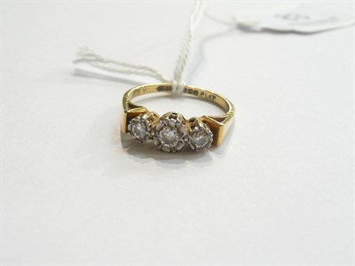 Lot 83 - An 18ct gold diamond three stone ring