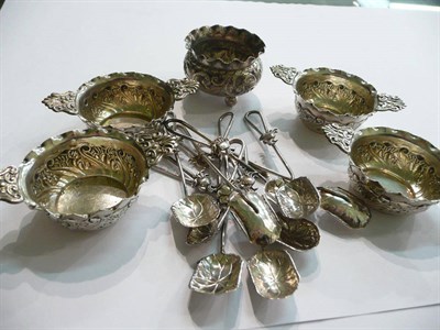 Lot 87 - Six 'crab' coffee spoons, four miniature embossed bowls with lug handles and a salt