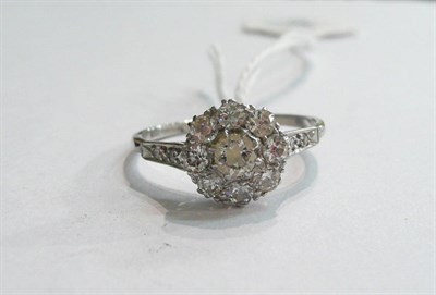 Lot 92 - A diamond cluster ring stamped 'PLATINUM'