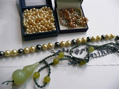 Lot 97 - Three simulated and one cultured pearl necklaces, a blue stone spectacle-set necklace and another
