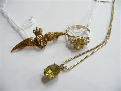 Lot 103 - A cluster ring, a pendant on chain and an RAF brooch