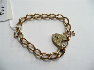 Lot 114 - A 9ct gold curb and lock bracelet