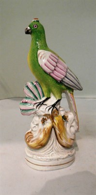 Lot 130 - A Staffordshire figure of a parrot