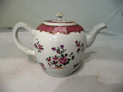 Lot 139 - A famille rose teapot and cover
