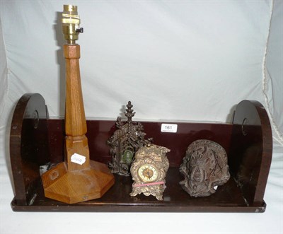 Lot 161 - Acorn Industries oak table lamp, money box, German wall bracket, carriage clock and a Bakelite book
