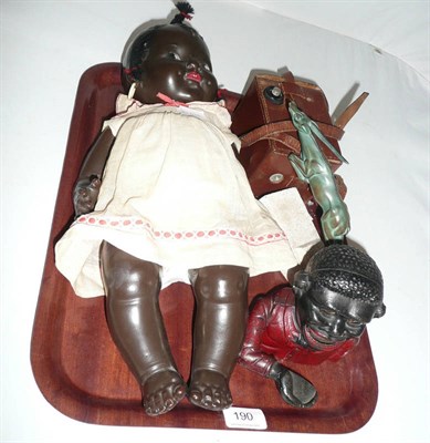 Lot 190 - Little Joe' iron money box, celluloid doll, a camera and a gazelle ornament