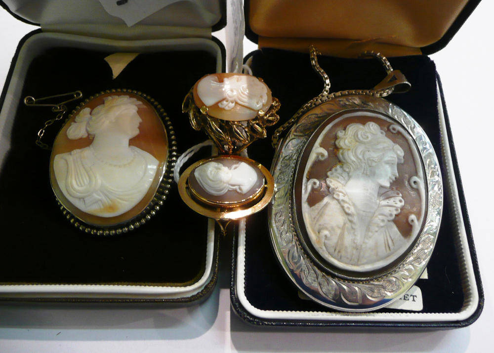 Lot 314 - A silver cameo-set locket on chain, a cameo brooch and two 9ct gold cameo rings