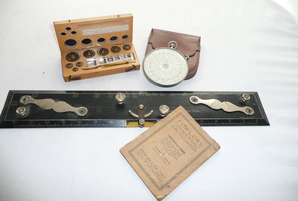 Lot 1044 - A Fowler's 'Universal Calculator' Circular Slide Rule, No.2475, with chrome body, in a stitched...