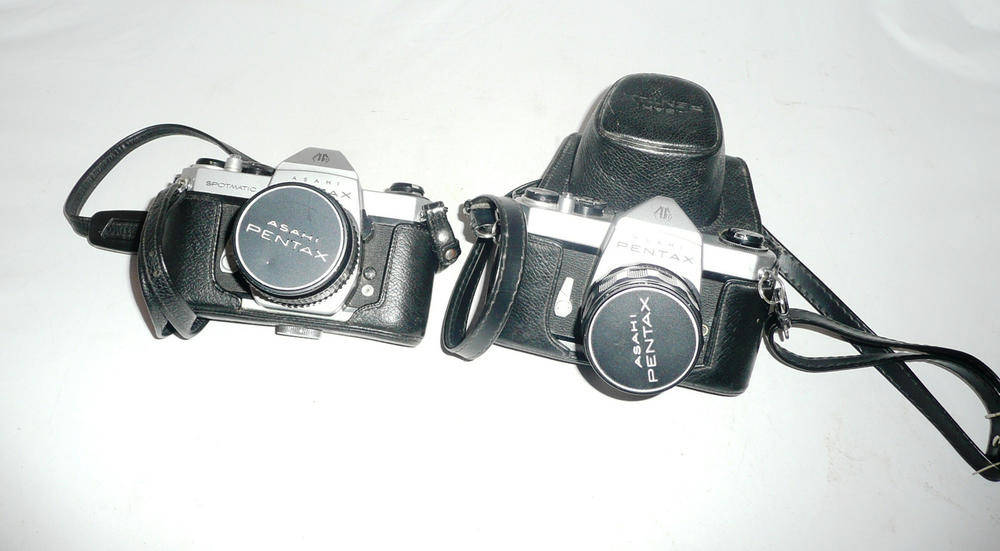 Lot 1108 - Two Pentax Cameras - Spotmatic SP II No.5431932 and SL No.3069254, in leather case