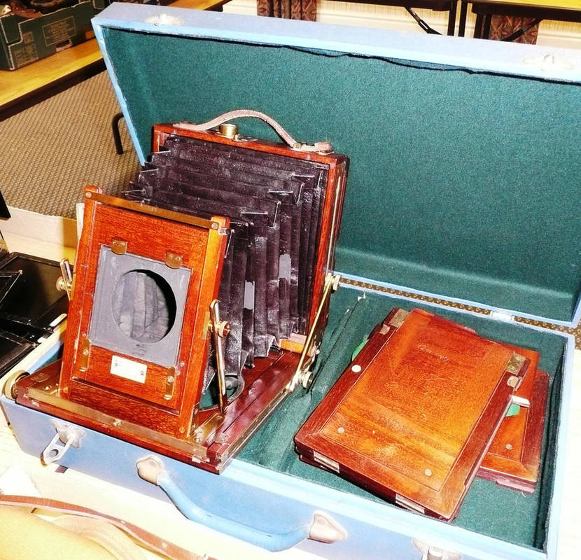 Lot 1123 - A 19th Century Mahogany and Brass Field Camera by W. Watson & Sons, London, with ivorine makers...