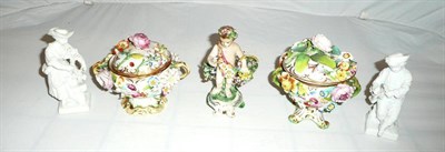 Lot 19 - Derby figure of a putto, two floral encrusted cups and covers, two white continental figures