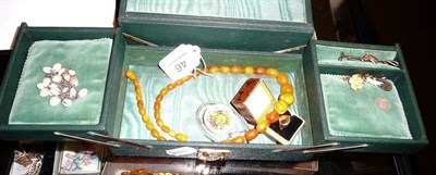 Lot 46 - Jewellery box and contents including a gold ring, amber necklaces, a lady's wristwatch, a crop...