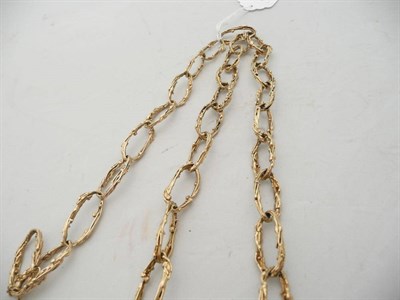 Lot 48 - A fancy link 9 carat gold necklace and matching bracelet