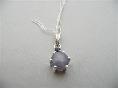 Lot 65 - Star sapphire pendant