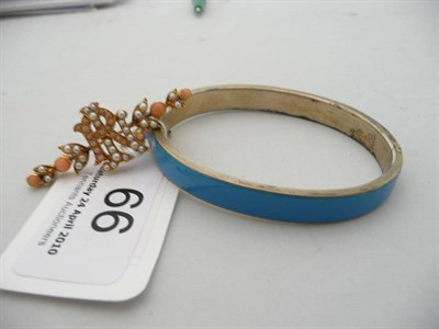 Lot 66 - Seed pearl and coral brooch and an enamelled bracelet