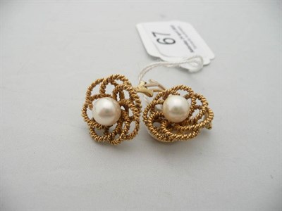 Lot 67 - Pair of 18 carat gold and cultured pearl-set clip-on earrings