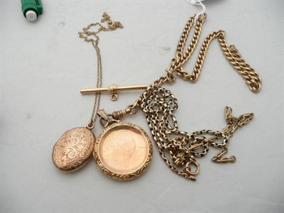 Lot 73 - A 9 carat locket on chain, a locket, a T-bar, two padlocks and assorted chains