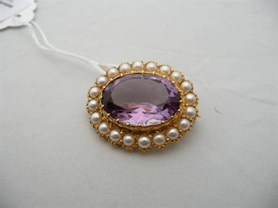 Lot 78 - Gold, pearl and amethyst oval brooch