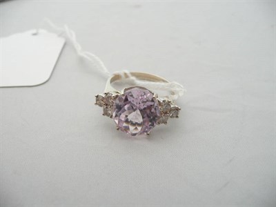 Lot 79 - A 14 carat white gold kunzite and diamond ring