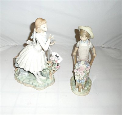 Lot 88 - Two Lladro figures - girl with posy and boy with wheelbarrow