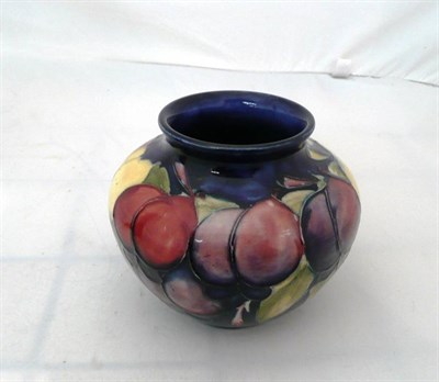 Lot 90 - A William Moorcroft 'Wisteria' pattern baluster vase