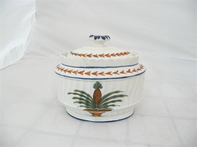 Lot 94 - A Staffordshire pearlware pottery sugar box and cover, circa 1800, of wrythen fluted oval...