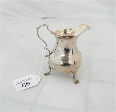 Lot 99 - A George II silver cream jug, London 1759