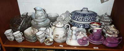 Lot 134 - Two shelves of decorative ceramics, glass and ornamentals including Carltonware tete-a-tete,...