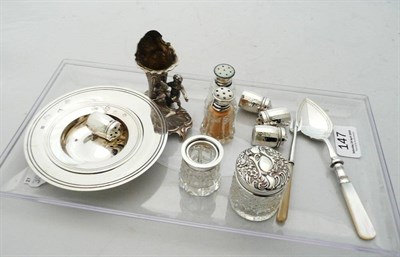 Lot 147 - Two silver Armada dishes, silver cruets, silver spoon, silver mounted glass jar, small silver...