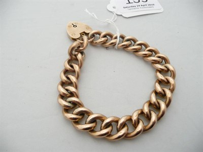 Lot 159 - A curb and lock bracelet stamped "9C", 28.1g approximately