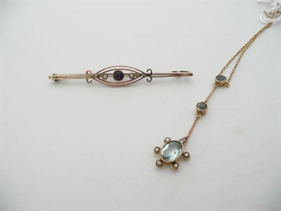 Lot 165 - An aquamarine and seed pearl drop pendant on chain (stamped "9C") and a bar brooch set with...